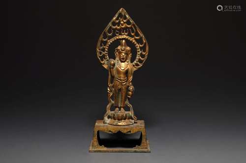 A GILT-BRONZE FIGURE OF STANDING GUANYIN.TANG DYNASTY