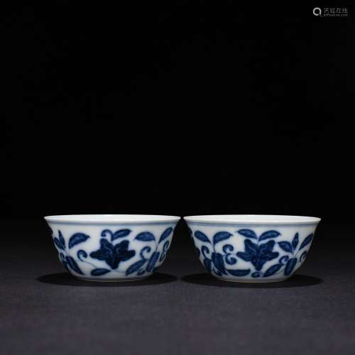 A pair of blue and white okra cups