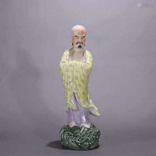 Porcelain and plastic pastel Dharma statues