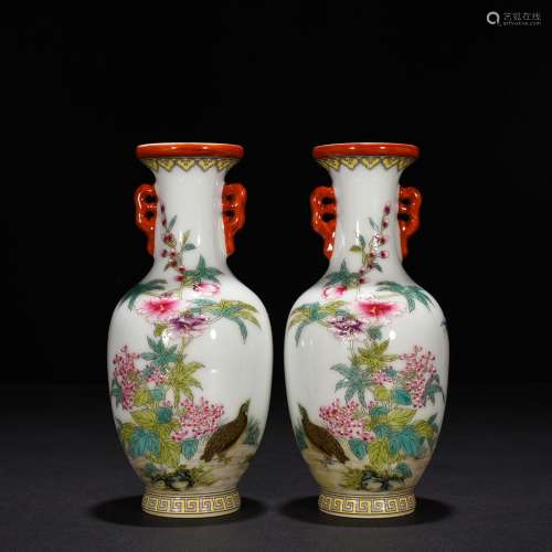 A pair of pastel flowers and birds amphora