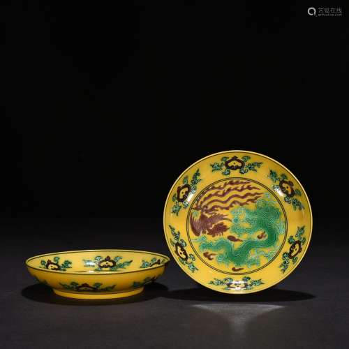 A pair of yellow earth element three-color dragon and phoeni...