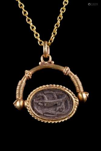 SWIVEL GOLD PENDANT WITH EGYPTIAN SCARAB