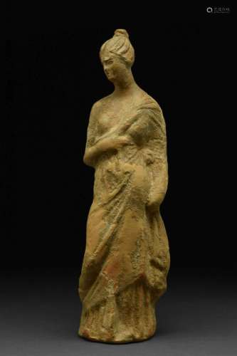 GREEK TERRACOTTA STATUE OF A YOUNG FEMALE