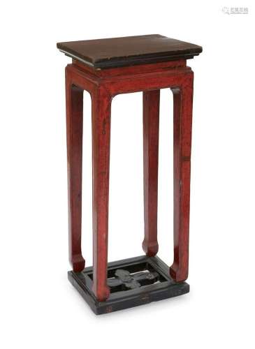 A Chinese red and black lacquered stand