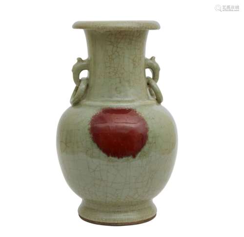 A Chinese iron red celadon porcelain vase