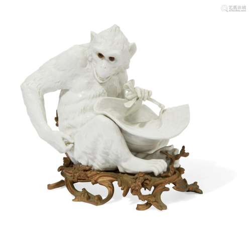 A large Continental porcelain model of a monkey