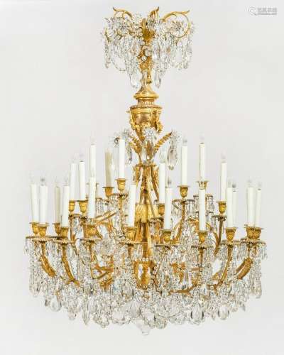 A Louis XVI style bronze & glass chandelier