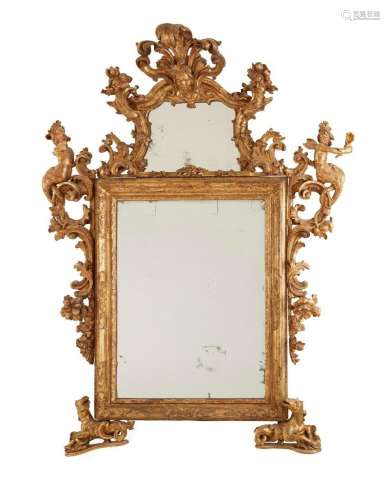 An imposing Venetian Baroque giltwood mirror