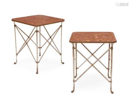 A pair of bronze, steel & marble tables