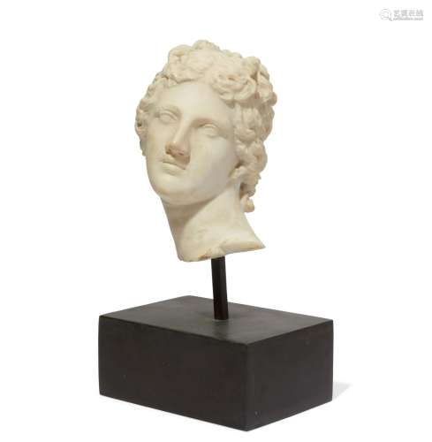 A white marble head of a woman