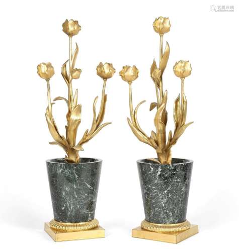 A pair of French tulip form candelabra