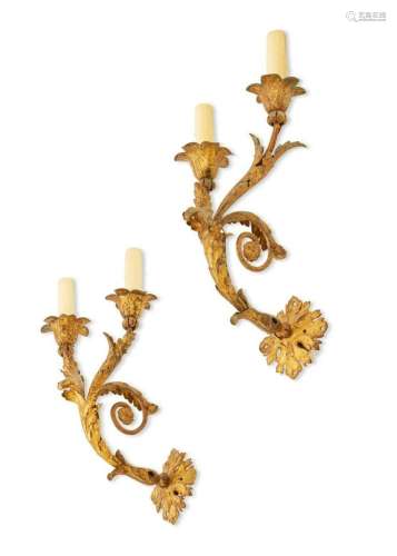A pair of Baroque style gilt metal wall lights