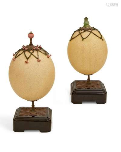 A pair of coral, hardstone, ostrich eggs
