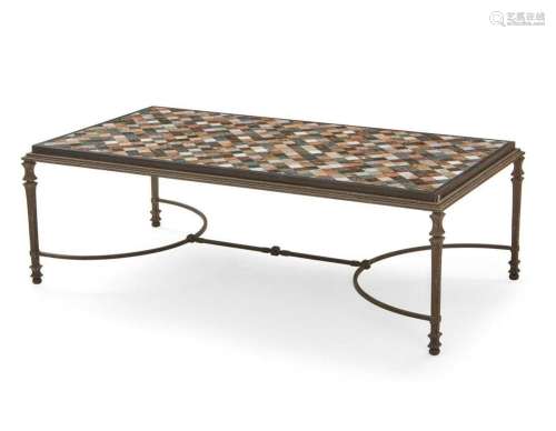 A specimen marble and ebonized iron low table