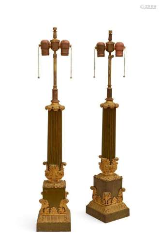 A pair of Neoclassical style column form lamps
