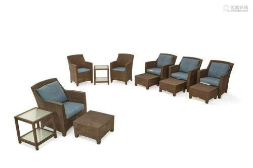 A 12pc set of Dedon plastic patio furniture