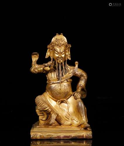 Sitting statue of Guan Gong in bronze gilt of Qing Dynasty