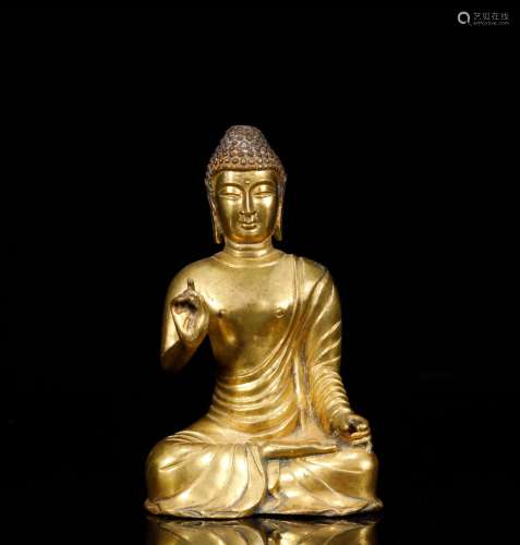 The statue of Sakyamoni in bronze gilt of Qing dynasty