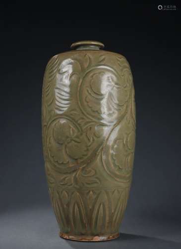Carved plum bottle in Yaozhou kiln of Song dynasty