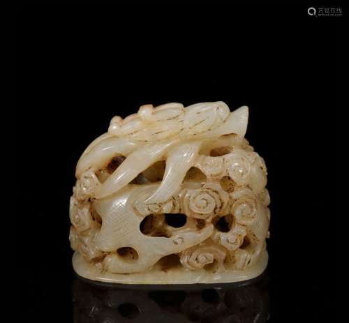 A Chinese Ming Dynasty Hetian jade dragon tattoo cap