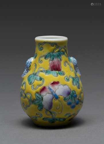 A CHINESE MINITURE FAMILLE ROSE VASE WITH ELEPHANT HEAD HAND...