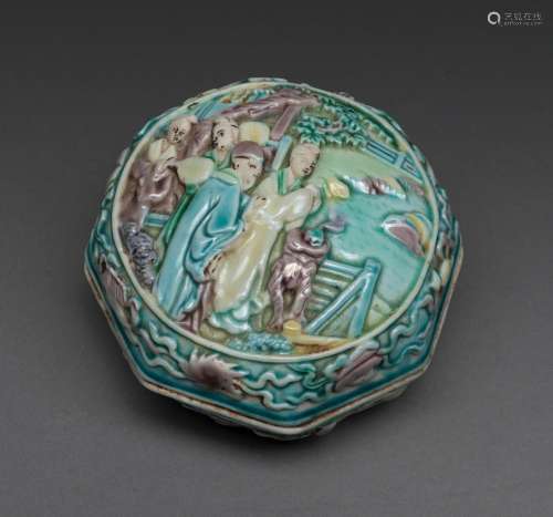 A CHINESE CARVED AND APPLIED FAMILLE ROSE BOX AND COVER, QIA...