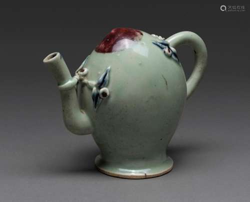 A CHINESE CELADON GLAZED UNDERGLAZE BLUE AND RED PEACH FORME...
