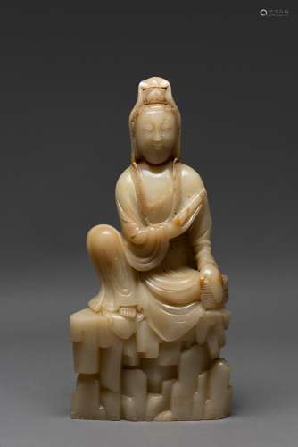 A LARGE SOAPSTONE FIGURE OF SEATED GUANYIN, SHEN DE TANG MAR...