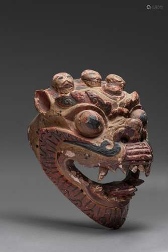 A WOOD CARVED TIBETAN MASK, 19TH-20TH CENTURY