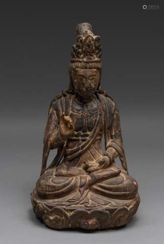 A CHINESE WOOD CARVED SEATED FIGURE OF GUANYIN, POSSIBLY MIN...