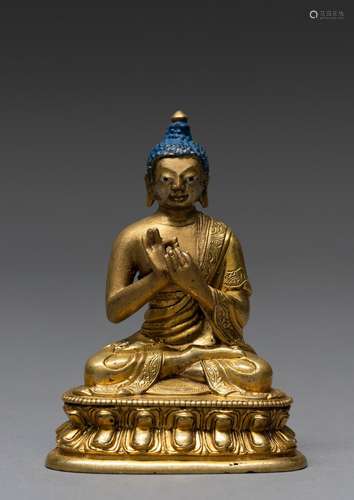 A CHINESE GILT BRONZE SEATED BUDDHA, QIANLONG PERIOD (1736-1...