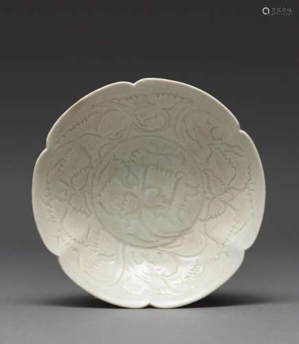 A RARE CHINESE QINGBAI FLOWER SHAPED CARVED DISH, NORTHERN S...