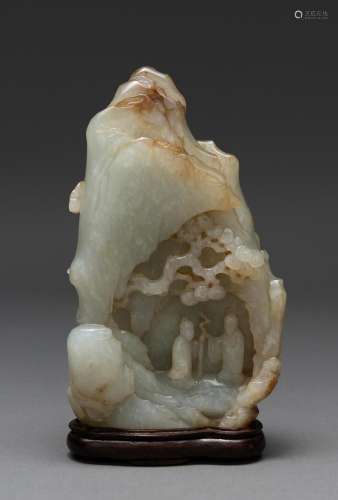 A CHINESE PALE WHITE JADE 'LANDSCAPE' BOULDER, QING ...