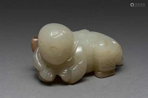 A CHINESE PALE WHITE JADE 'BOY AND LOTUS' CARVING, S...