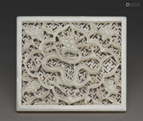 A CHINESE PALE WHITE JADE DRAGON PLAQUE, MING DYNASTY (1368-...