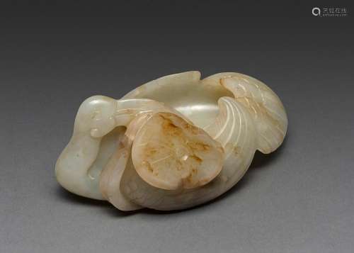 A CHINESE PALE WHITE JADE CARVED CRANE SHAPED WASHER, QING D...