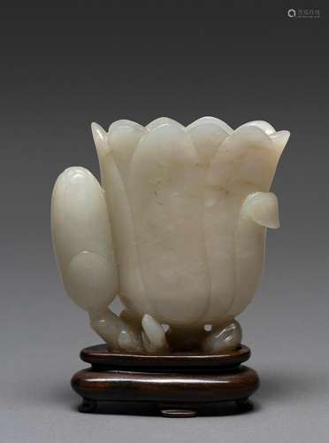 A CHINESE SMALL WHITE JADE FLOWER SHAPED VASE, QING DYNASTY,...