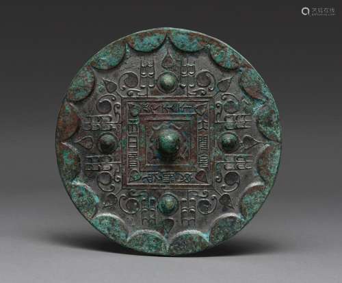 A CHINESE BRONZE MIRROR, HAN DYNASTY (206BC-220AD)