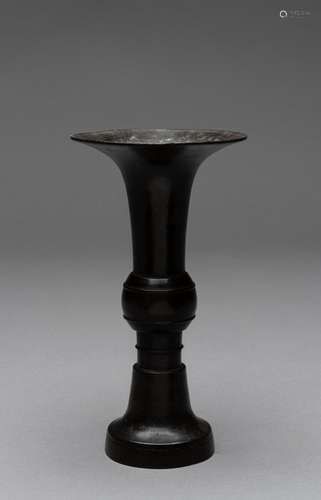 A CHINESE BRONZE GU-FORMED VASE, SONG DYNASTY (960-1279)