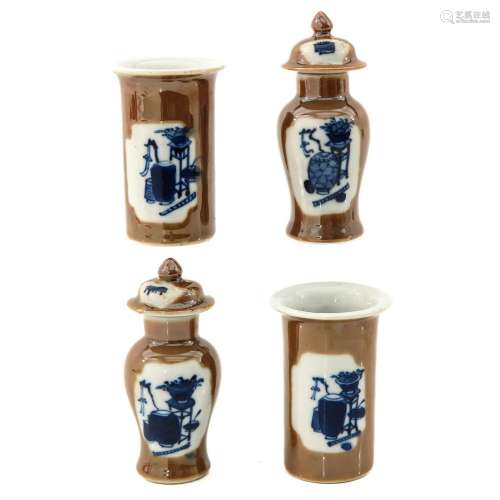 A Collection of 4 Miniature Garniture Vases