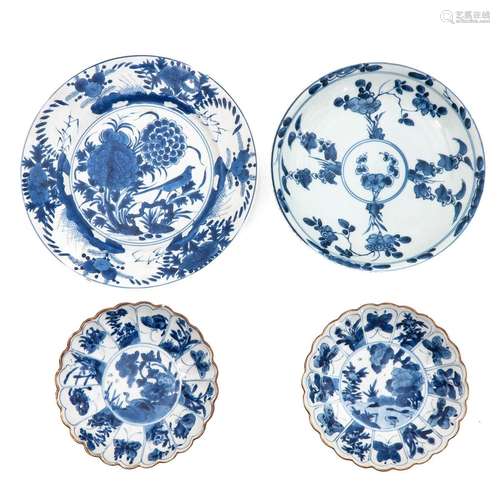 A Collection of 4 Blue and White Plates