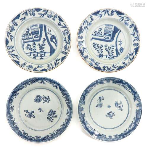 A Collection of 4 Blue and White Plates