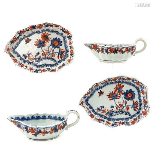 A Pair of Imari Gravy Bowls and Underplates