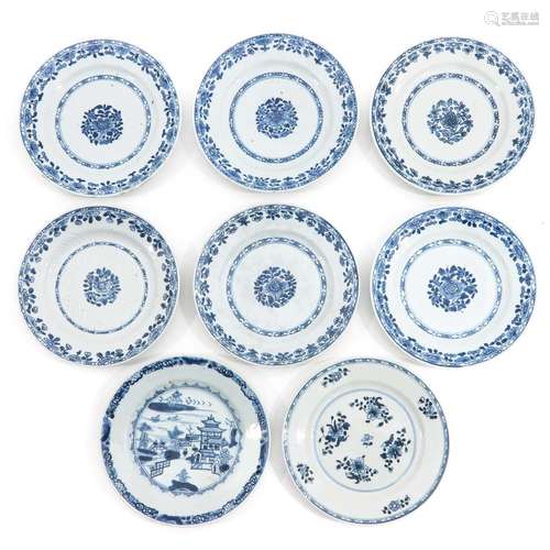 A Collection of 8 Blue and White Plates