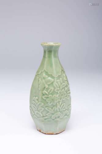 A JAPANESE CELADON MOULDED TOKKURI (SAKE BOTTLE) POSSIBLY ED...