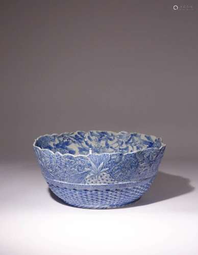 A LARGE JAPANESE SETO WARE BLUE AND WHITE MOULDED BOWL MEIJI...