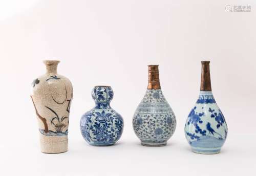 THREE CHINESE BLUE AND WHITE VASES AND A CRACKLED GLAZE VASE...