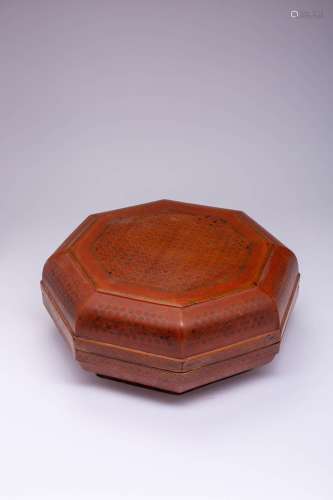 A LARGE CHINESE THREE COLOUR LACQUER OCTAGONAL BOX AND COVER...
