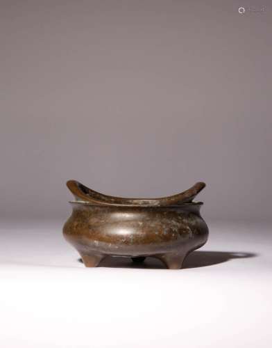 A CHINESE BRONZE INCENSE BURNER QING DYNASTY The compressed ...