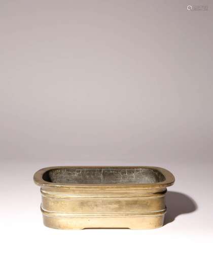 A CHINESE GILT-BRONZE RECTANGULAR INCENSE BURNER QING DYNAST...